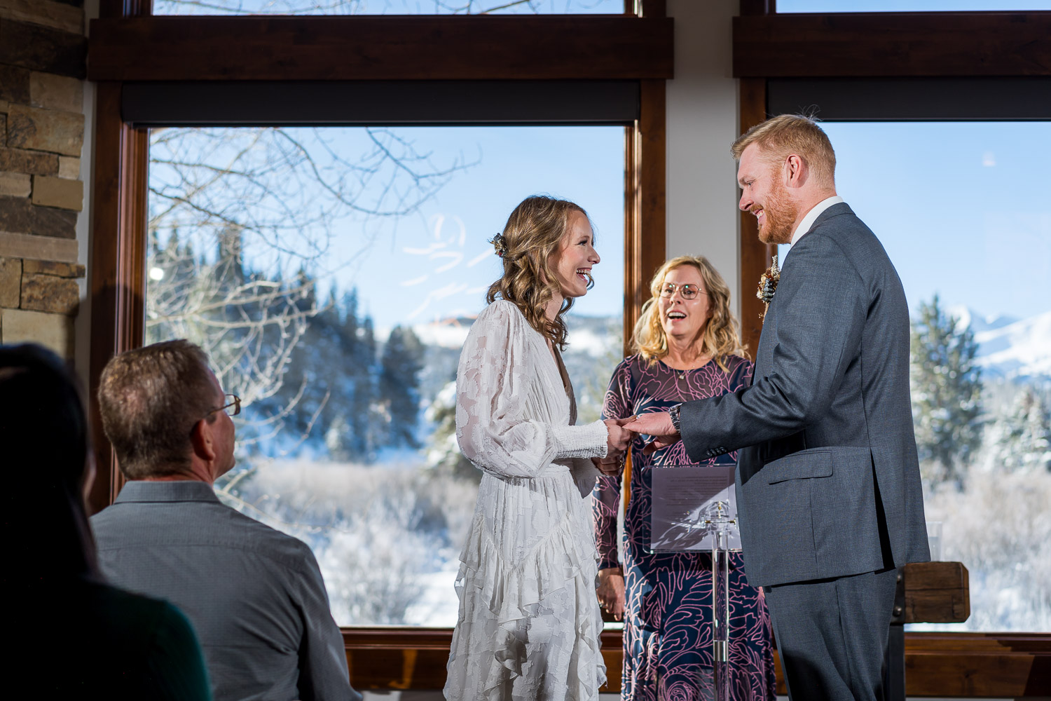 indoor wedding ceremony on snowy day in breckenridge colorado