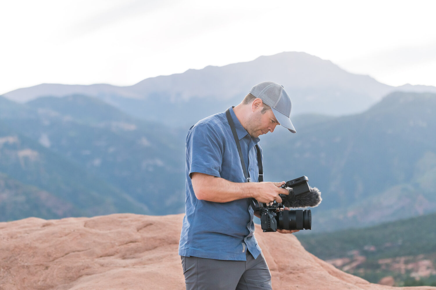 marc shooting with a zoom lens on a rigged out video camera